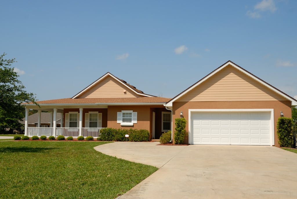 Beautiful modern suburban house with newly upgraded steel garage door